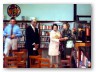 Mario Gonz&aacute;lez, Library Director, and the Belpr&eacute; family in the stacks at the New York Public Library.